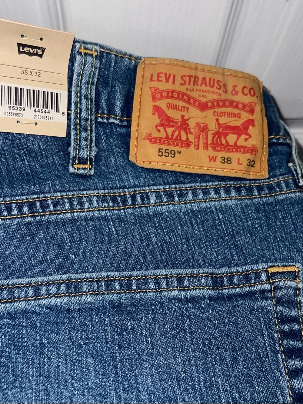 Levi's 559 Relaxed Straight Jeans in Blue with Tan Patch 38x32
